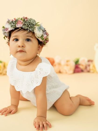 On the move. Capturing the crawling stage is a key part of a milestone session, showing off your baby's latest achievement.