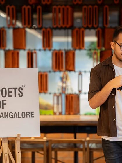 A performer shares his piece at the Mother's Day event. It was a morning filled with warmth, care, and beautiful words.