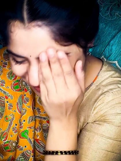 A candid moment from a recent photoshoot. I often feel a little shy in front of the camera, but my husband, the photographer, always knows how to make me smile.