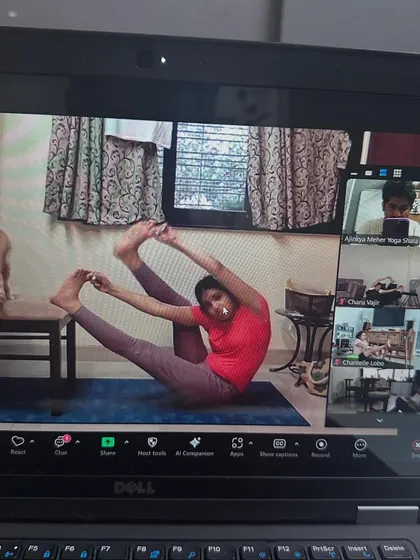 Even the cat is joining our online yoga session. It's a reminder to find joy and playfulness in our practice.