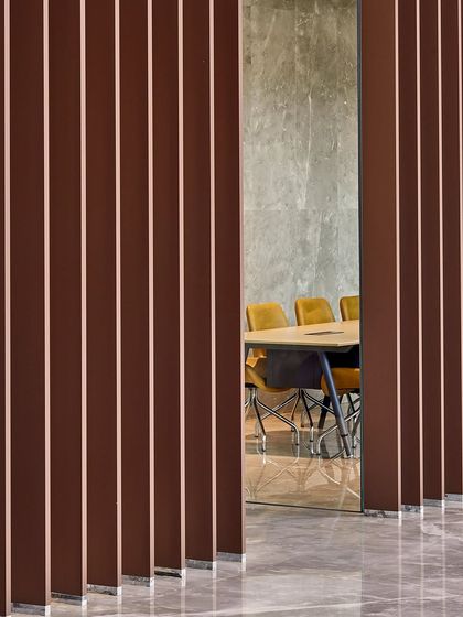 At Sumadhura Capitol Towers in Bengaluru, I used vertical fins to create a sense of rhythm and privacy for a meeting room. The design focuses on open, column-free floor plates that are adaptable to the evolving needs of its users.