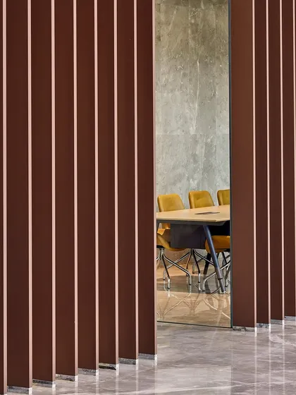 At Sumadhura Capitol Towers in Bengaluru, I used vertical fins to create a sense of rhythm and privacy for a meeting room. The design focuses on open, column-free floor plates that are adaptable to the evolving needs of its users.