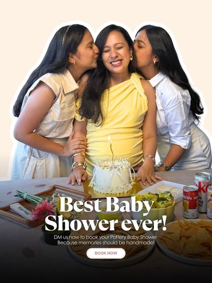 A beautiful moment from a baby shower where the mom-to-be is celebrated with a cake and kisses from her friends, blending celebration with creativity.