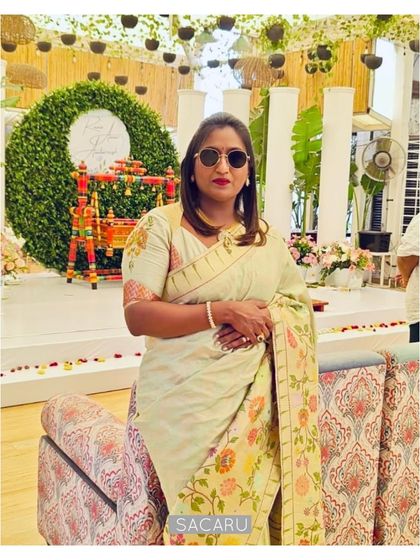 Our client Sangeetha looking poised in her custom Sacaru blouse, designed to elevate her gorgeous pistachio green Paithani saree with rust orange brocade accents.