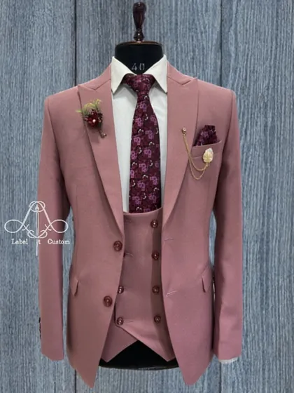 Who says suits have to be boring? This dusty pink three-piece suit is a perfect example of how I use color to create customized outfits for all your occasions.