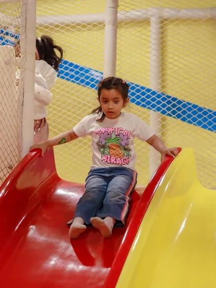 Sliding into a world of fun. Our slides are a central feature of every party and open play session.