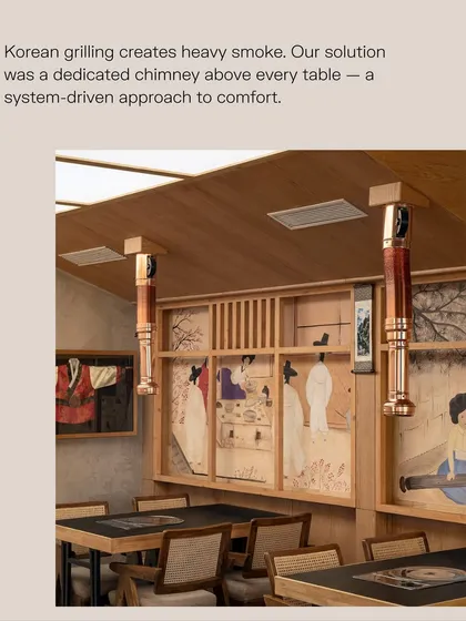 To manage the heavy smoke from Korean grilling, we designed a dedicated chimney system for every table. This system-driven approach integrates a technical requirement into the design, ensuring guest comfort without compromising the aesthetic.