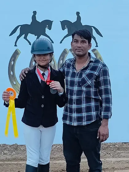 Standing proud with one of our young riders after her amazing performance at the Delhi Horse Show 2024. We support our riders every step of the way.