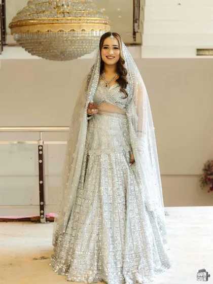 A modern bride in a stunning silver lehenga. I gave her a dewy, fresh makeup look that felt light and looked absolutely elegant for her Anand Karaj.