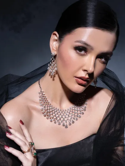 Another look at this stunning diamond set. The off-the-shoulder styling and soft lighting create an aura of pure elegance and luxury, perfect for a high-end jewellery campaign.