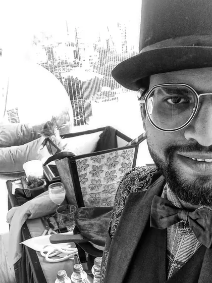 A black and white selfie in my full magician's attire. A reminder that magic is not a miracle, but it is always entertainment.