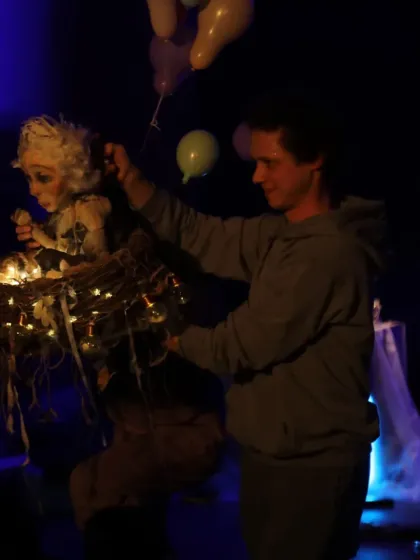 The main puppet character from 'Sea of Possibilities' is lifted by balloons. The show is filled with empowering messages about discovering one's potential, for audiences of all ages.