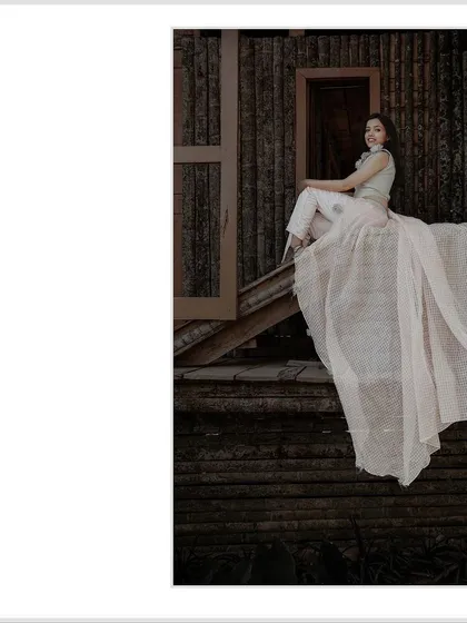 A slightly different angle of the same solo portrait, capturing a classic and graceful pose.