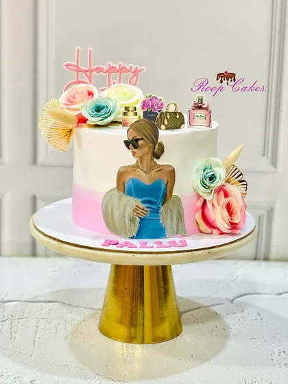 A chic and fashionable cake for a stylish birthday girl, featuring an edible illustration and miniature designer accessories.