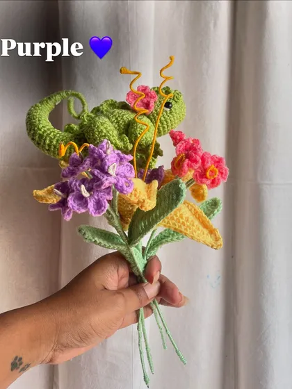 Adding a purple flower to the growing Rapunzel bouquet, building up the layers of color.