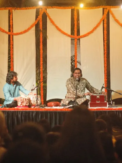 A view from the audience of a performance with Sanam Khan.