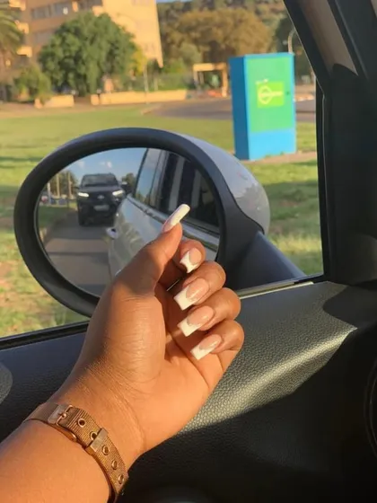 Another client-clicked photo of a classic French manicure on long square nails. A clean and classic look that is always a great choice.