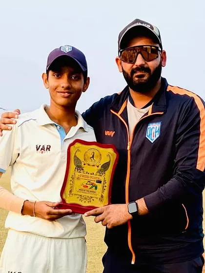 With one of our key players from the U-14 team, celebrating his contribution to our tournament victory with a well-earned plaque.