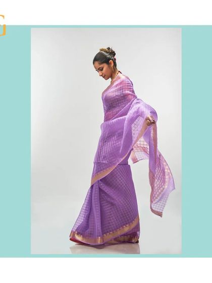 The sheer pallu of the African Violet saree, demonstrating its light and airy texture.