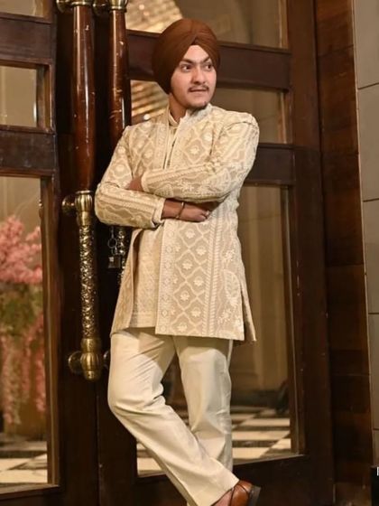 A relaxed and confident pose from our client, Gkirat. This image showcases how my outfits are designed to be comfortable without sacrificing an ounce of style.