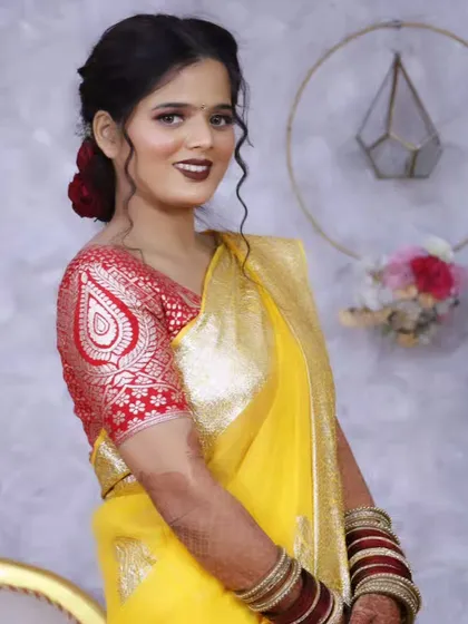 A beautiful smiling portrait of the bride, her makeup looking fresh and radiant.