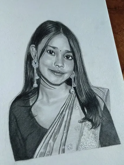 This sketch of a woman in a saree with long earrings is a great example of a classic portrait.