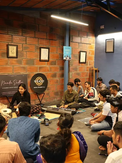 A baithak, or house concert, creates an intimate atmosphere unlike any other. Here, I am performing for a small, engaged audience, where the energy between the artists and listeners is immediate and powerful. This performance included vocals and piano.