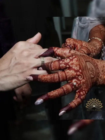 Another shot of the beautiful engagement stain, showing how the deep color complements the bride's hands.