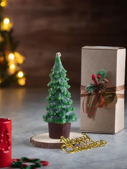 The same Christmas tree candle, this time in a lovely two-tone green. Each one is hand-poured, so no two are exactly alike.