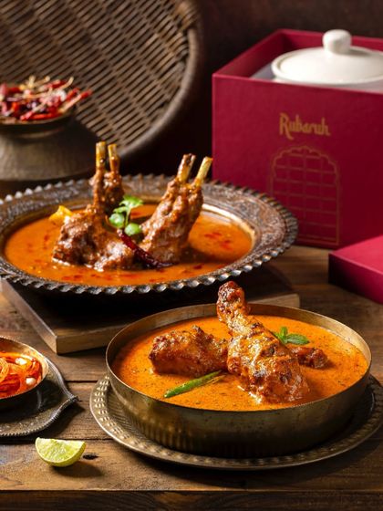 A shot featuring both the Mutton and Chicken curries from Rubaruh, showcasing their signature dishes together for a campaign.