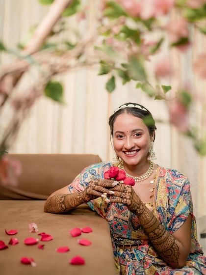A smile that says it all. Capturing the pure happiness of a bride during her mehndi photoshoot.