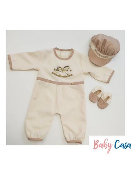 Simple, classic, and full of charm. This neutral toned romper features a sweet rocking horse embroidery and comes with a matching personalized cap and booties for a timeless look.
