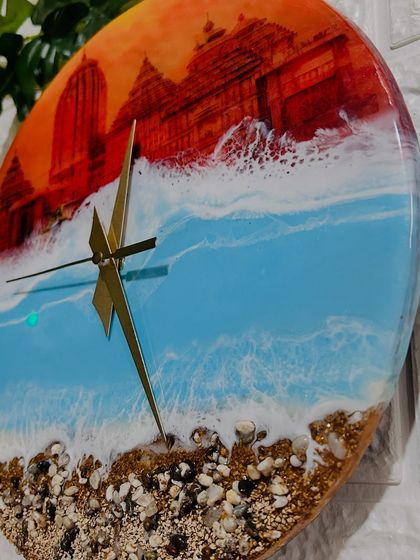 Another angle showcasing the beautiful details of the temple and the dynamic movement of the resin waves. This clock is a tribute to a sacred place.