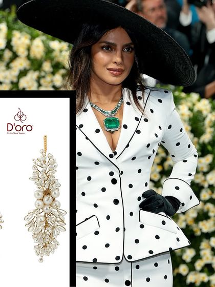 Inspired by Priyanka Chopra's bold Met Gala fashion. Our classic pearl and crystal danglers would add the perfect touch of elegance to her striking black and white polka dot suit.