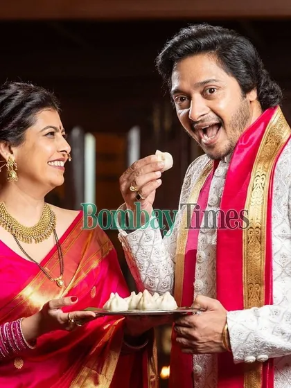 A fun, candid moment from the festive shoot with Shreyas Talpade. The traditional attire was chosen to feel authentic and celebratory.