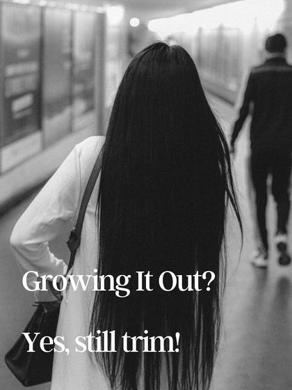 Even if you're growing your hair out, you still need to get it trimmed. Removing the split ends is crucial for preventing breakage that can slow down your progress toward longer, healthier hair.