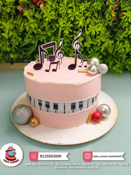 A symphony of sweetness! This music-themed cake with a piano keyboard and musical notes is perfect for a musician or music lover.