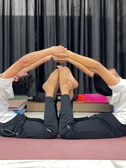 Partner yoga is a beautiful practice of trust, communication, and shared strength. Here, my students demonstrate a powerful Acro Yoga Full Cobra Pose, a posture that is built on mutual support and focus.