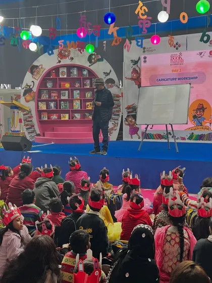 Addressing the students at the World Book Fair. It was inspiring to see them explore the art of caricature and experiment with expressions.