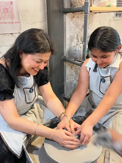 There's nothing quite like the shared laughter between a mother and daughter as they create together. Our family pottery sessions are all about making memories while making masterpieces on the pottery wheel.