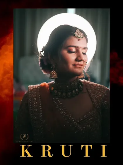 A serene portrait of the bride, Kruti. We used a ring light to create a halo effect, giving her an angelic and radiant glow as she closes her eyes in a moment of calm.