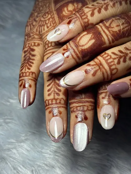 The cat eye effect adds a beautiful shimmer that catches the light, making these bridal nails perfect for photos.