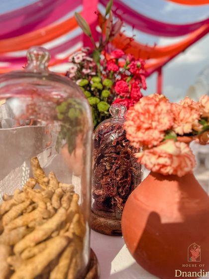 A close-up of the spice decor, with jars of turmeric and dried red chilies adding color and texture. It's a nod to the old trade routes and the sensory richness of a bazaar.