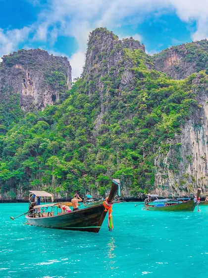 Island hopping in the turquoise waters of Thailand. I charter private boats for your group to explore hidden coves and famous beaches at your own leisure.