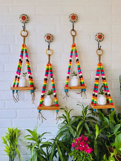 Another look at our colorful beaded wall shelves, perfect for creating that 'Pinteresty' wall setup in your balcony or garden.