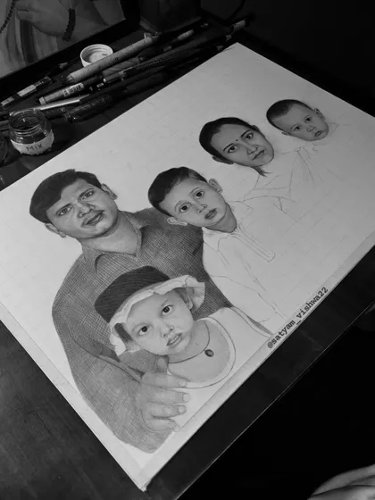 Here you can see the portrait nearing completion. The grid lines are gone, and the final shading is being applied to bring all the individual faces together into a cohesive group.