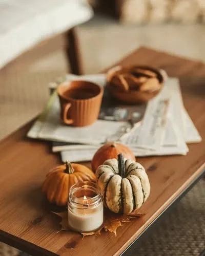 There's nothing like a scented candle to welcome the autumn season. This image captures a cozy fall moment with one of my jar candles, perfect for creating a warm and inviting space on a cool day.