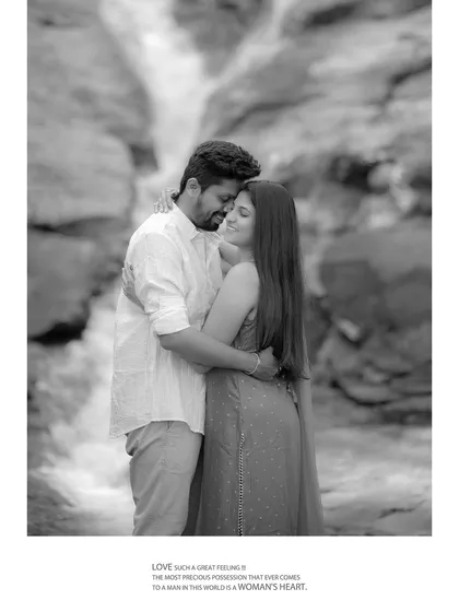 A classic black and white portrait that emphasizes the emotional connection. This timeless image from their waterfall pre-wedding shoot is pure romance.