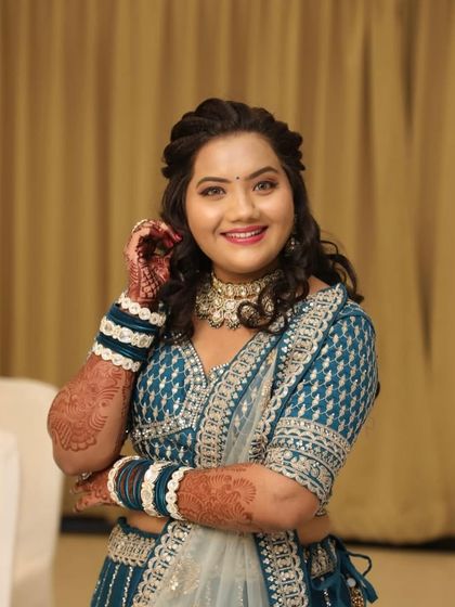 Another close-up of the client, highlighting her beautiful smile and the stunning jewellery.