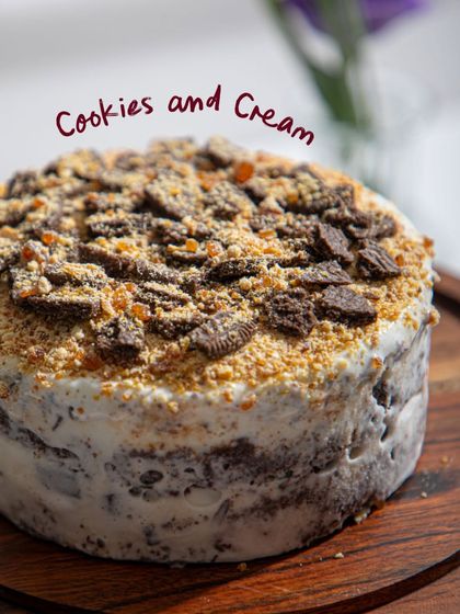 Our Cookies and Cream ice cream cake, generously topped with crumbled cookies for that perfect crunch. A timeless classic with a cool, creamy twist.